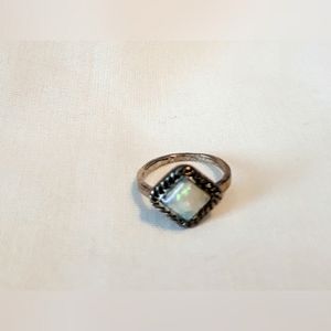 Women's Opal and Silvertone ring Sz 4 1/2